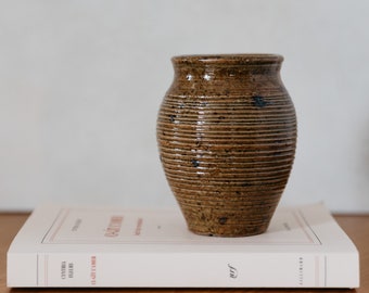 Small striated stoneware vase