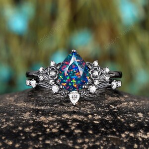 Rhodium Black Gold Black Opal Bridal Set, Gothic Pear Facet Black Fire Opal Engagement Ring Set, Nature Inspired Floral Witchy Wedding Ring
