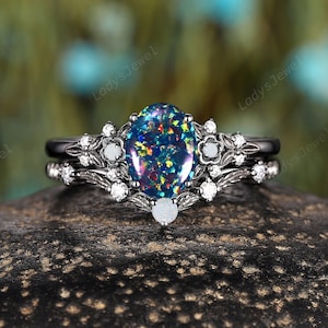 Black Fire Opal Gothic Engagement Ring Set, Rhodium Black Gold White Opal Witchy Bridal Set, Oval Cut Color Change Opal Wedding Ring for Her