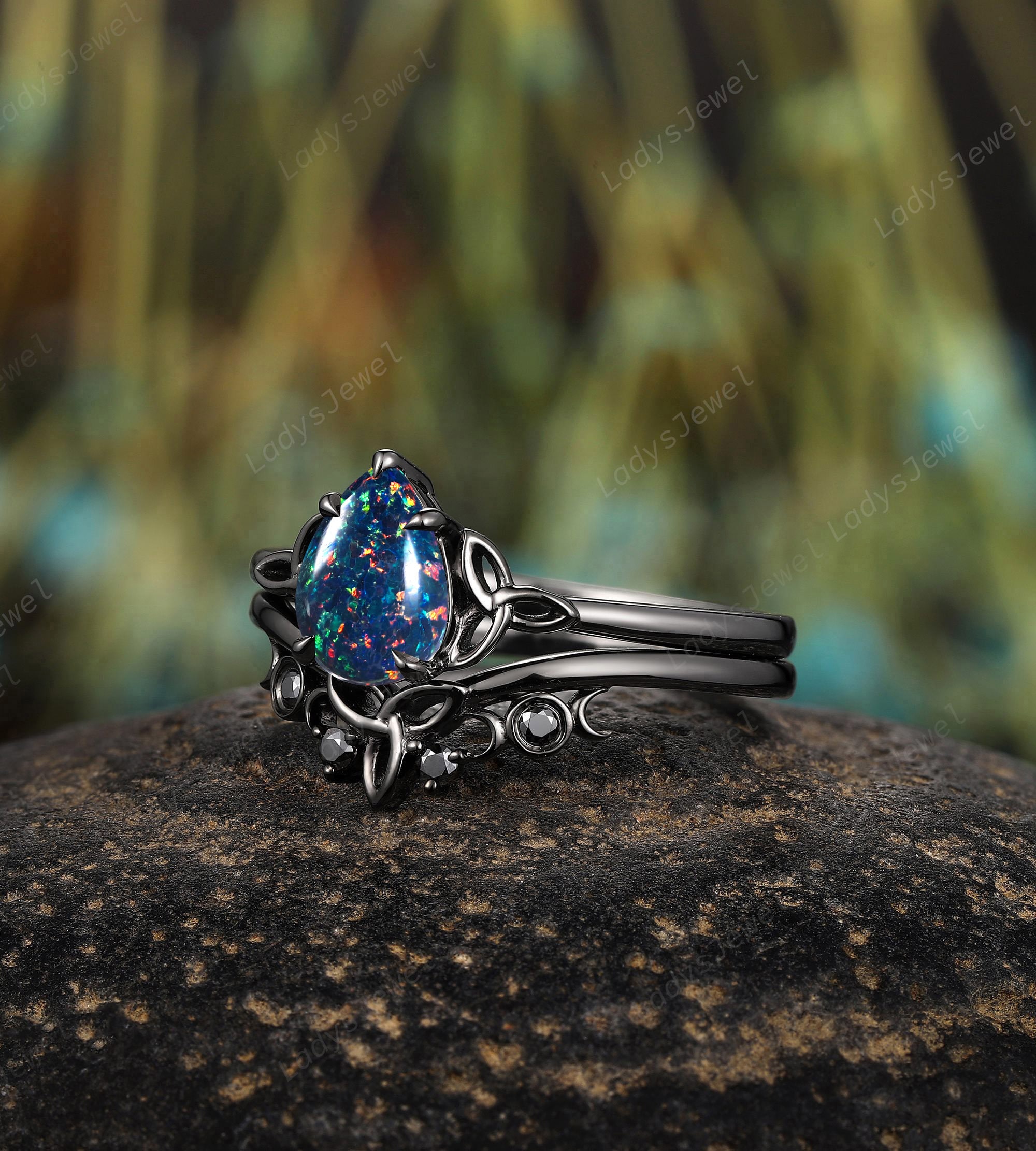 Gothic Pear Cut Black Opal Engagement Rings Crescent October