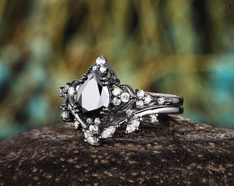 Pear Black Moissanite and Diamond Engagement Ring, Rhodium Black