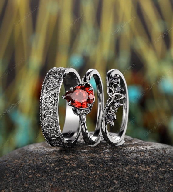 Gothic Pear Cut Garnet His and Hers Wedding Bands Celtic Knot