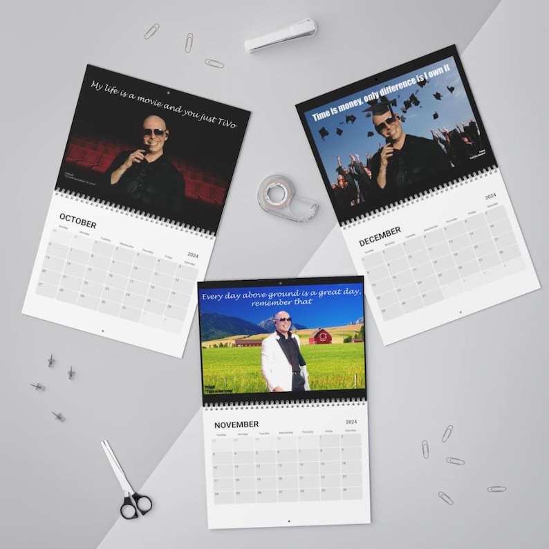 May include: Three 2024 calendars with images of a man wearing sunglasses. The October calendar has the text "My life is a movie and you just Tivo". The December calendar has the text "Time is money, only difference is I own it". The November calendar has the text "Every day above ground is a great day, remember that".