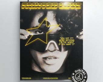 May include: A black and white poster with a person wearing a futuristic visor and a yellow star over their eye. The text "Fainted Love" is in yellow at the top of the poster. The text "You got it? We're nothing I'm the worst if you want it" is in yellow at the bottom of the poster.
