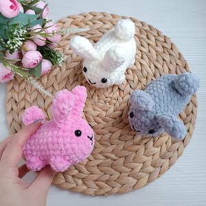 Three crocheted bunny toys. One is white, one is pink, and one is gray.
Quick & Enjoyable Project – Works up fast, ideal for last-minute Easter gifts, markets, or craft fairs
Versatile Use – Great as a plush toy, shelf decor, or holiday ornament
Instant PDF Download (English) – Digital pattern available immediately after purchase with clear step-by-step guidance