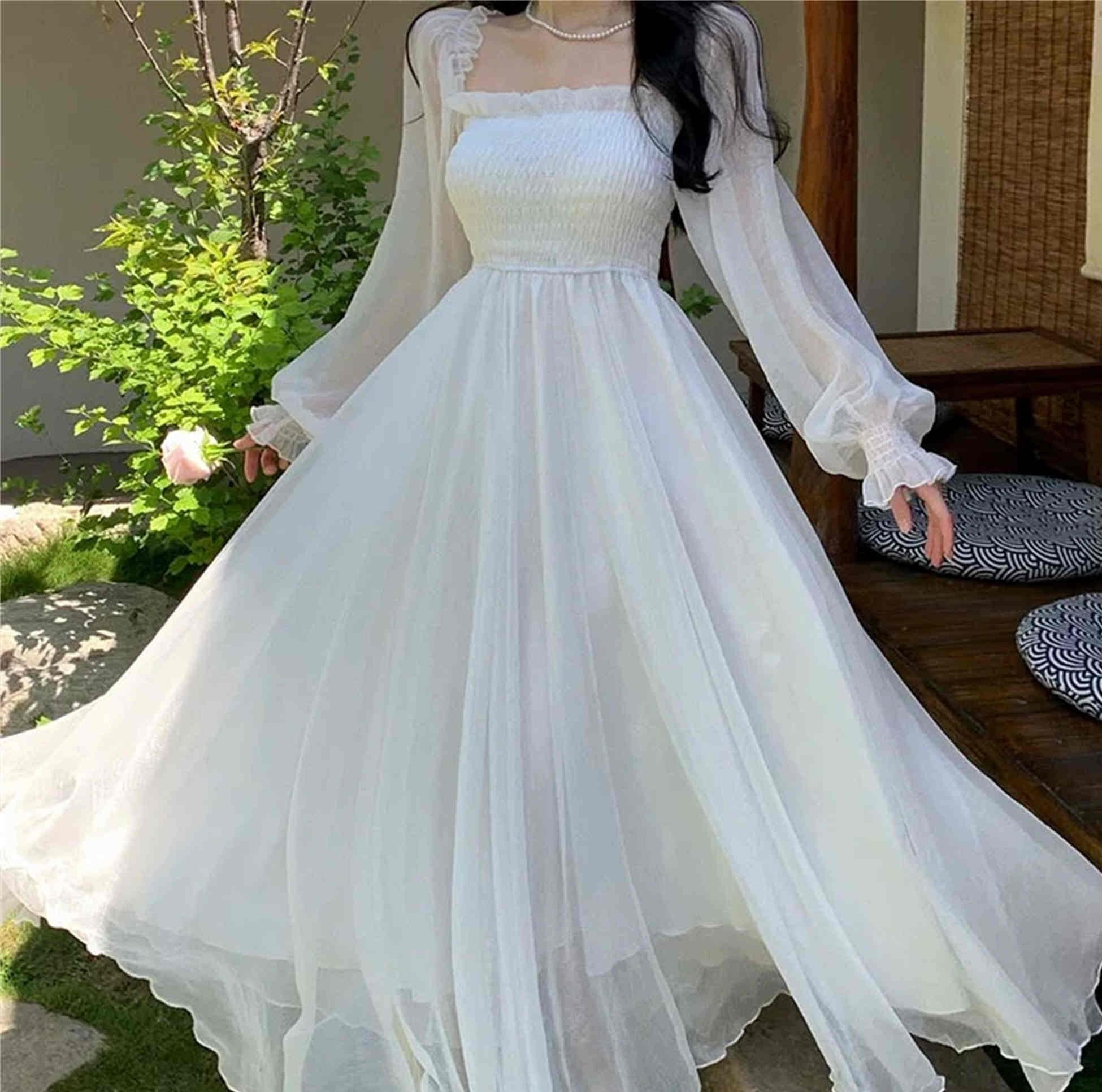 white flowy dress wedding