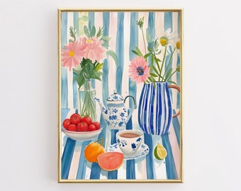May include: A watercolor painting of a still life featuring a blue and white teapot, a blue and white pitcher, a cup of tea, a bowl of red berries, a citrus fruit, and a grapefruit on a blue and white striped tablecloth. The painting is surrounded by pink and white flowers.