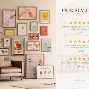 May include: A wall gallery featuring 14 framed prints of cocktail illustrations. The prints are in various colors and styles, including pink, yellow, and orange. The prints are arranged in a grid pattern on a white wall. The text "Guest Check" and "NEGRONI" are visible on two of the prints. The text "OUR REVIEWS" is visible on the right side of the image, along with five-star reviews from customers.