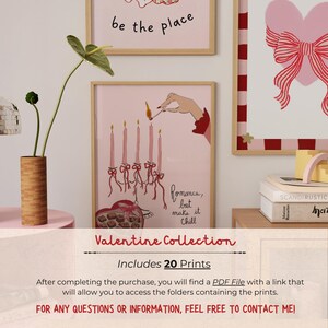 May include: Pink framed art prints with Valentine's Day themes. One print shows a hand lighting candles, another has a heart with a bow, and a third says "be the place". The collection includes 20 prints.