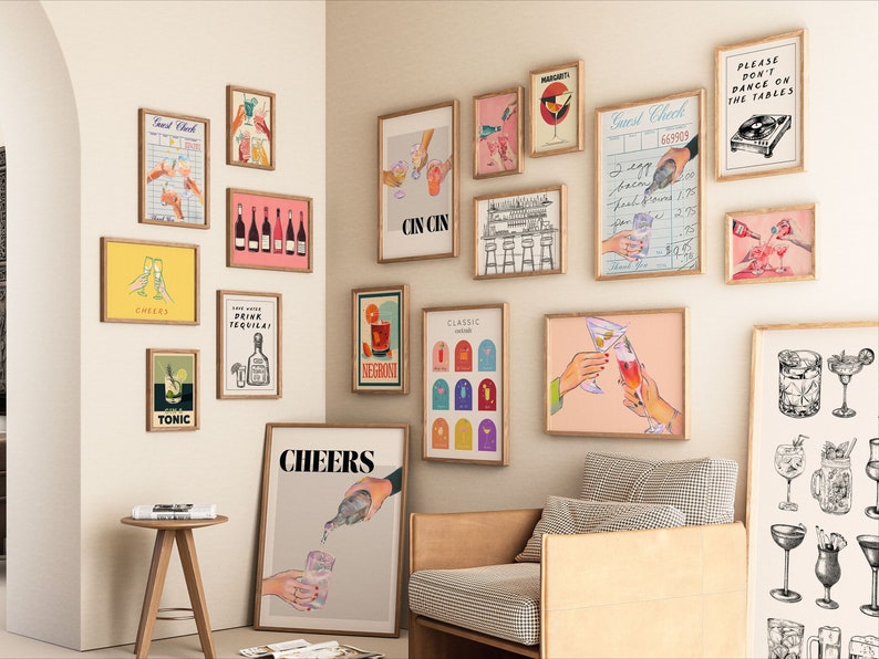 May include: A wall gallery featuring various framed prints with a cocktail theme. The prints include illustrations of cocktails, bar scenes, and text related to drinking. The prints are in a variety of colors and styles, and they are arranged in a visually appealing way.