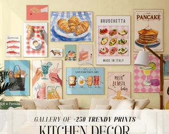 May include: A gallery wall featuring various kitchen-themed art prints. The prints include images of croissants, pancakes, sardines, and cocktails. Text on the prints includes "Bruschetta", "Pancake", and "Pasta La Vista Baby". The words "Kitchen Decor" are also visible.