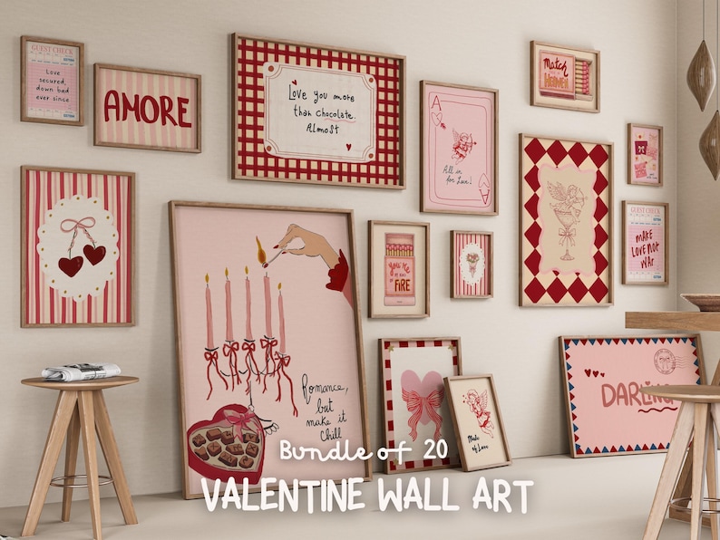 May include: A collection of 20 Valentine's Day themed wall art prints in various sizes and designs. The prints feature romantic illustrations, phrases, and a color palette of pink, red, and white. Some prints include the word "AMORE".