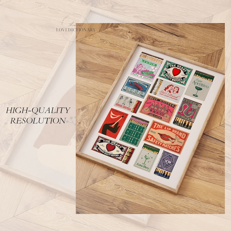 May include: A framed collection of vintage matchbox labels with various designs, including a heart, a lobster, a bicycle, and a martini glass. The labels are in a variety of colors, including red, green, blue, and yellow.
