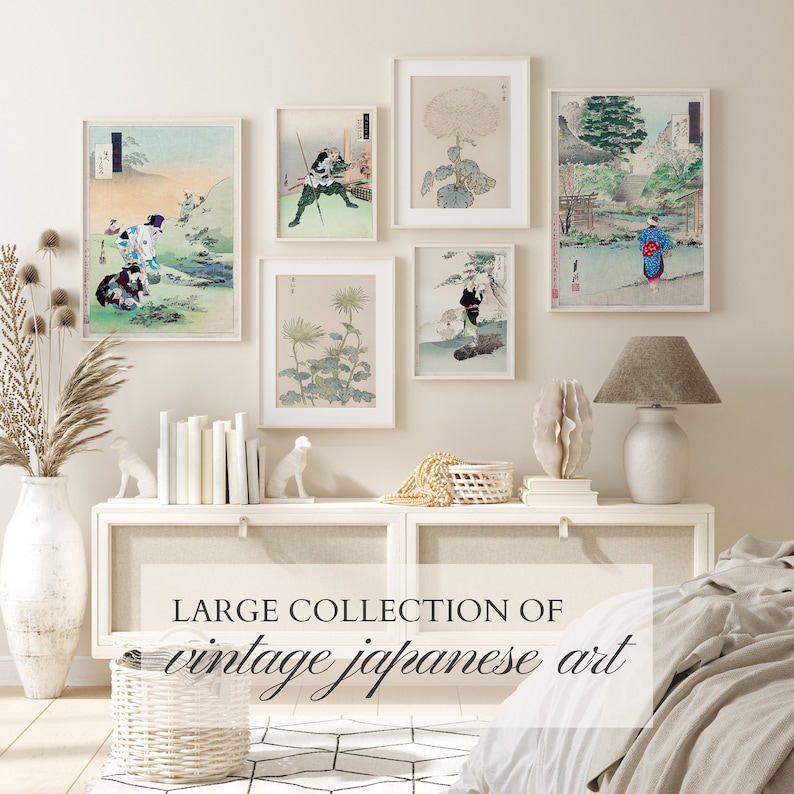 May include: A collection of six framed vintage Japanese art prints, featuring scenes of nature, people, and flowers. The prints are displayed on a white wall above a white dresser with a white lamp on the right side. The dresser is decorated with a white vase with dried flowers, a white basket, and two white ceramic animal figurines.