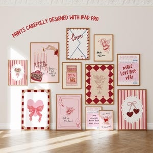 May include: A collection of framed art prints with a Valentine's Day theme. The prints feature illustrations of hearts, cherubs, and romantic phrases in red and pink hues. The text "PRINTS CAREFULLY DESIGNED WITH IPAD PRO" is at the top.