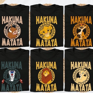 A collage of six black t-shirts with the text "HAKUNA MATATA" printed on them, featuring illustrations of different animals from the Disney film The Lion King.