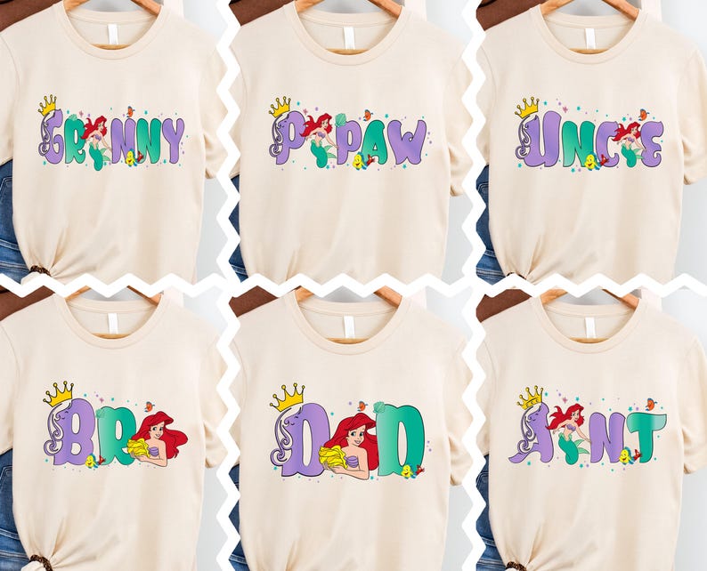 six different t-shirts with the same design, featuring the character Ariel from the Disney movie "The Little Mermaid". The design includes the character's name in a stylized font, along with various decorative elements such as crowns and other elements associated with the character's character.