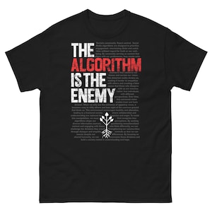 May include: Black t-shirt with the text "THE ALGORITHM IS THE ENEMY" in white and red. The shirt also features additional text and a graphic of a tree with roots.