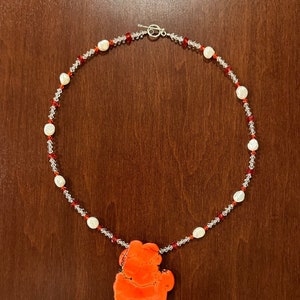 Pink coral, freshwater pearl, and Swarovski crystal necklace