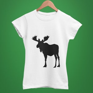 May include: White t-shirt with a black silhouette of a moose on the front.