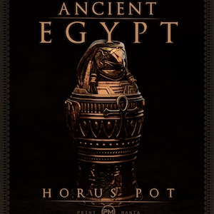May include: A bronze-colored Horus pot with the words "ANCIENT EGYPT" and "HORUS POT" in gold lettering. The pot features a detailed design of the Horus head and an Ankh symbol. The Print Mania Studios logo is at the bottom.