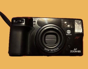 Vintage Minolta AF Zoom 65 Camera - Perfect voor Fotoliefhebbers en Verzamelaars - Uitstekende Staat met Zoomlens