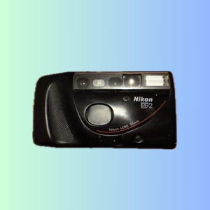 Nikon RF2 – Vintage 35mm Point-and-Shoot Film Camera with 35mm Nikon Lens – Tested & Working