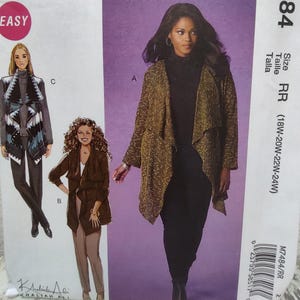 May include: McCall's sewing pattern M7484 featuring three jacket designs. The pattern includes sizes 18W-24W. The main image shows a woman wearing a gold and black patterned jacket. The word "EASY" is in a pink circle.