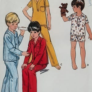 May include: A sewing pattern illustration featuring four pajama sets: a blue striped button-down set, a solid red button-down set, a solid yellow short-sleeve top with long pants, and a white short-sleeve set with a colorful animal print.