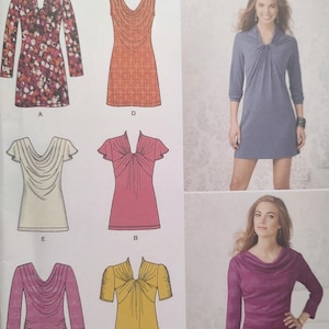 May include: Simplicity sewing pattern featuring various women's tops and dresses. The designs include a long-sleeved dress with a cowl neck, a sleeveless dress, and tops with different necklines and sleeve lengths. The pattern includes the website address www.simplicity.com.