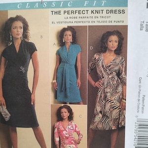 May include: A sewing pattern for a knit dress with four different styles. The pattern is from McCall's and is called "The Perfect Knit Dress". The dress is shown in four different colors: black, teal, brown and white, and pink and white.