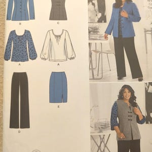 May include: Simplicity sewing pattern featuring designs by Khaliah Ali. The image shows a blue blazer, a gray vest, a skirt, and pants. The pattern includes sizes EUR 36-44 and FR 38-46. The website simplicity.com is also visible.