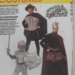 May include: A McCall's Costumes pattern for Majestic Knights. The pattern includes costumes for a king, a knight, and Robin Hood. Sizes range from X-Small to Large for men and boys sizes 2-12. The image shows the costumes.