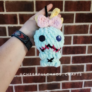Mini Green Baby Doll Scrump Häkelanleitung