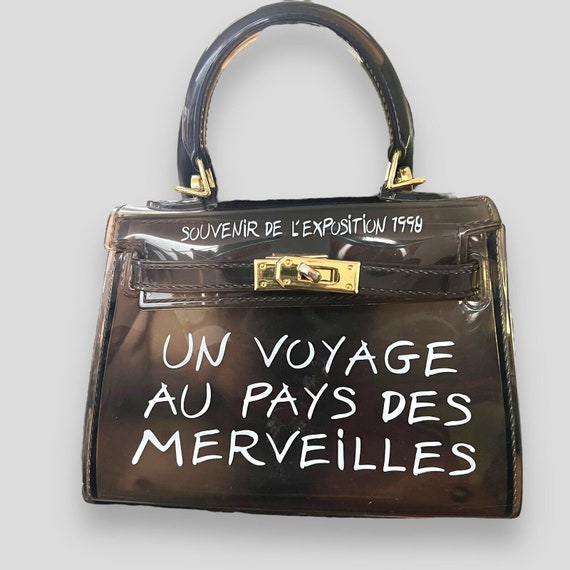 Un voyage au pays des merveilles tas hermes cheap