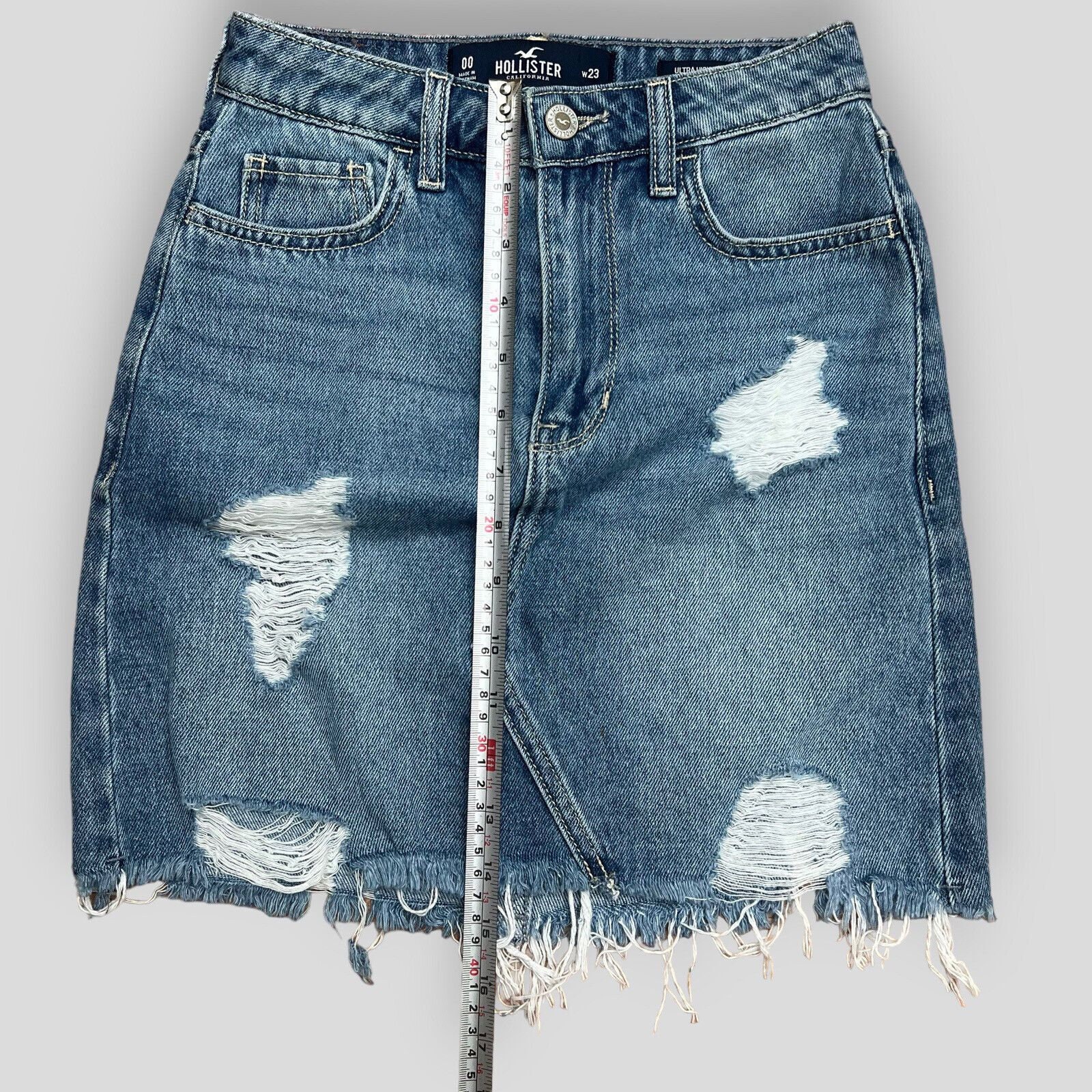 Hollister High Rise Blue Denim Skirt With Raw Hem Distress Look
