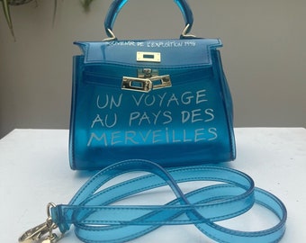 Aqua Blue Un Voyage Au Pays 1998 Handbag With Adjustable Strap Small. Used Vgc