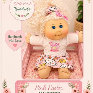 May include: A doll with curly blonde hair and blue eyes wearing a white long-sleeve shirt with a pink graphic and a pink skirt featuring a white bunny pattern. The doll has a matching hair accessory. Text includes Little Patch Wardrobe and Pink Easter OUTFIT.