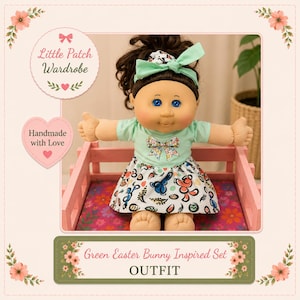 May include: A doll with dark brown hair, blue eyes, and a light skin tone, wearing a mint green short-sleeved top with a bow graphic and a white skirt featuring colourful bunny and egg patterns. The doll has a matching mint green hair bow.