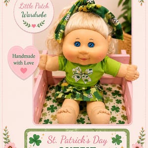 May include: A doll with blonde hair and blue eyes wearing a green t-shirt with a shamrock bow graphic and a matching green patterned skirt and headband. The outfit features St. Patrick's Day themes with shamrock prints. Text reads Little Patch Wardrobe, Handmade with Love, and St. Patrick's Day OUTFIT.