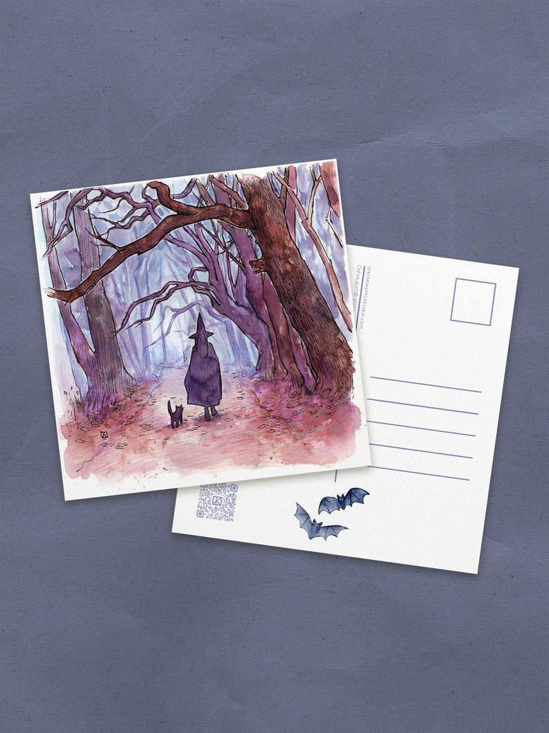 May include: Watercolor illustration of a witch walking through a misty forest with a black cat. The scene is depicted on a postcard, with a blank postcard and bat stickers nearby. The color palette includes shades of purple, brown, and gray.
