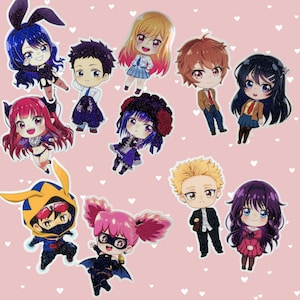 May include: A collection of colorful anime-style character stickers on a pink background with white hearts. The stickers feature various characters with unique outfits and hairstyles, including characters with bunny ears, wings, and other accessories.