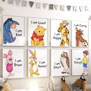 May include: A set of nine framed prints featuring characters from Winnie the Pooh, each with a positive affirmation. The prints include Eeyore, Winnie the Pooh, Tigger, and Piglet, with messages like "I am Kind" and "I am Brave".