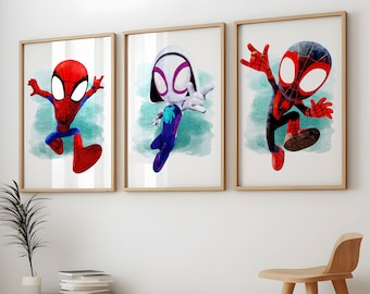 May include: Three framed art prints featuring stylized Spider-Man characters. The prints showcase Spider-Man, Spider-Gwen, and Miles Morales in dynamic poses against a watercolor-style background. The frames are a light wood color.
