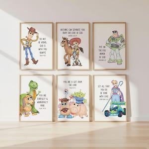 May include: Six framed art prints featuring cartoon characters with inspirational quotes. The prints include characters like Woody, Buzz Lightyear, and others, with phrases such as "Do Not Be Afraid, God Is With You Always."