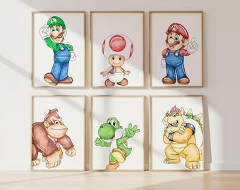 May include: Six framed watercolor prints featuring characters from the Super Mario video game series. The characters include Luigi, Toad, Mario, Donkey Kong, Yoshi, and Bowser. Each character is depicted in a colorful, cartoon style, set against a white background.