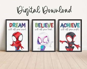 May include: Three framed prints with black borders. Each print features a superhero illustration and an inspirational word: DREAM, BELIEVE, and ACHIEVE. The text "Digital Download" is at the top. The prints are on a light wood-grain surface.