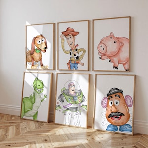 May include: Six framed watercolour prints featuring characters from the Toy Story film franchise. The prints include images of Slinky Dog, Woody, Hamm, Rex, Buzz Lightyear, and Mr. Potato Head. Each character is depicted in a colourful, hand-painted style.