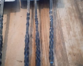 Hand forged steel spatula with pineapple twist handle.