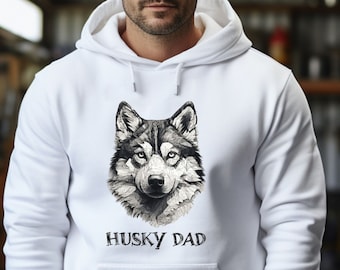 May include: White hooded sweatshirt with a black and white wolf graphic and the text "Husky Dad" printed on the front.